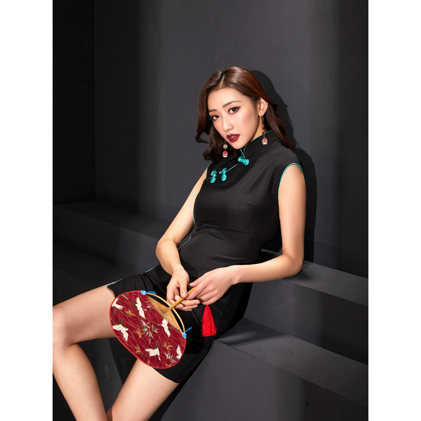 Sleek Black Modern Qipao with Turquoise Accents